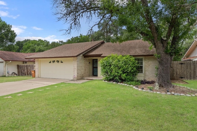 single story home featuring brick siding, an attached garage, fence, and driveway