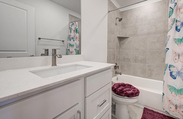 full bath featuring vanity, shower / tub combo with curtain, and toilet