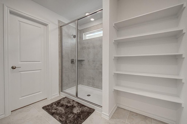 17325 Casanova Ave, Pflugerville, TX 78660 - bathroom featuring a shower stall, tile patterned flooring, and recessed lighting