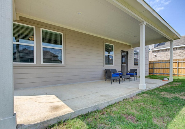 view of patio with fence