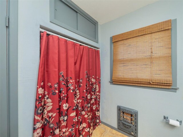 1207 Flag St, Llano, TX 78643 - full bathroom with a shower with shower curtain
