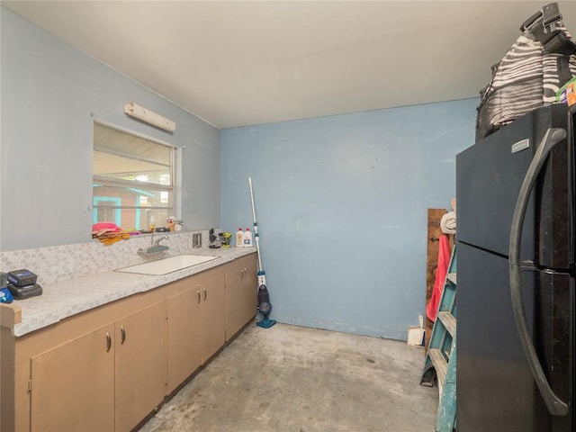 1207 Flag St, Llano, TX 78643 - bathroom featuring vanity and concrete flooring
