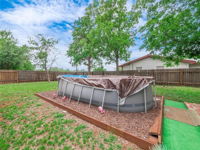 1207 Flag St, Llano, TX 78643 - view of yard featuring a fenced in pool and a fenced backyard