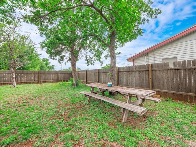 1207 Flag St, Llano, TX 78643 - view of yard featuring a fenced backyard