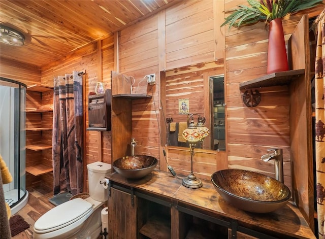 1207 Flag St, Llano, TX 78643 - full bath featuring a sink, wood walls, wooden ceiling, and a shower stall