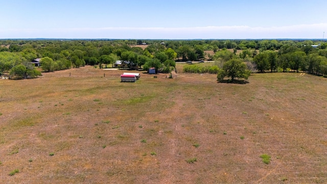 birds eye view of property featuring a rural view