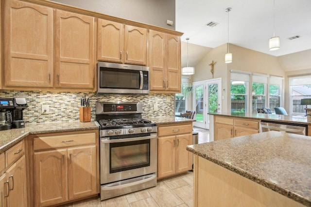 kitchen with visible vents, decorative backsplash, light stone countertops, appliances with stainless steel finishes, and vaulted ceiling