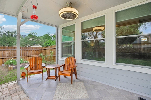sunroom featuring a wealth of natural light