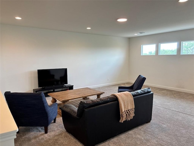 living room featuring carpet flooring, recessed lighting, baseboards, and visible vents