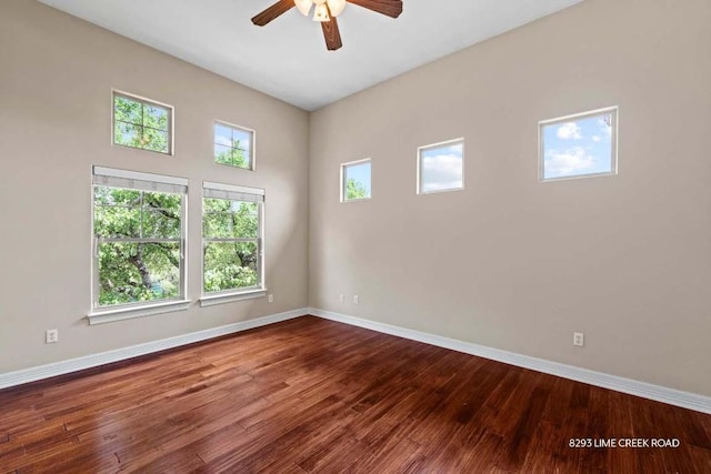 8293 Lime Creek Rd, Leander, TX 78641 - empty room featuring baseboards, a ceiling fan, and wood-type flooring