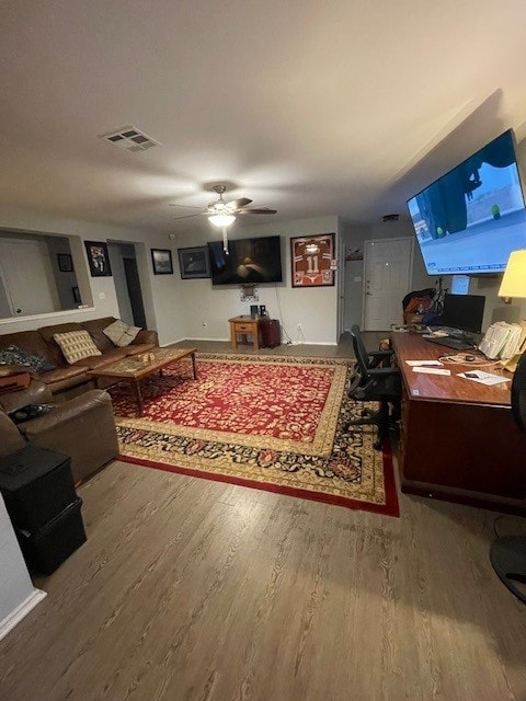 3508 Sandy Brook Dr, Round Rock, TX 78665 - living room featuring a ceiling fan, visible vents, and wood finished floors