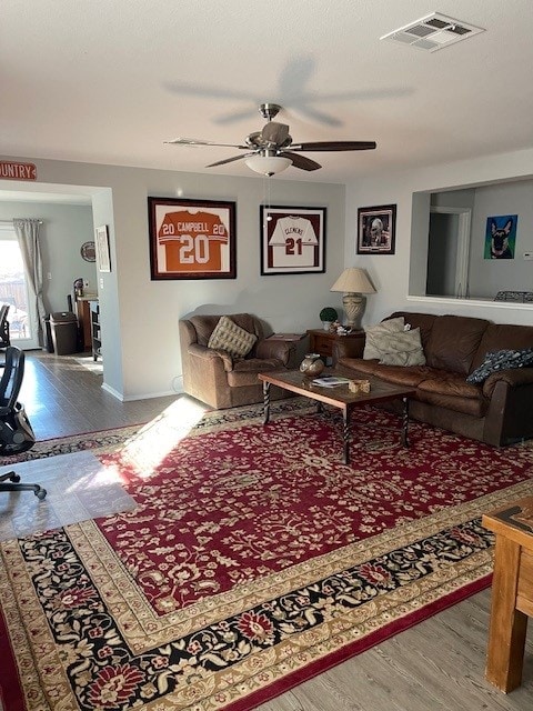 3508 Sandy Brook Dr, Round Rock, TX 78665 - living room with baseboards, ceiling fan, visible vents, and wood finished floors