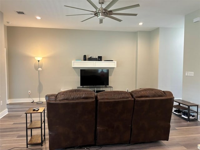 170 Nuuanu Rd, Bastrop, TX 78602 - living area featuring a ceiling fan, baseboards, wood finished floors, and recessed lighting