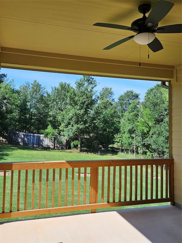 view of patio / terrace featuring fence and a ceiling fan