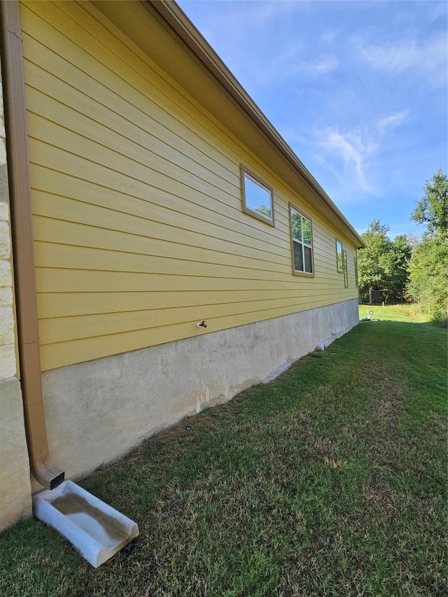 170 Nuuanu Rd, Bastrop, TX 78602 - view of property exterior with a lawn
