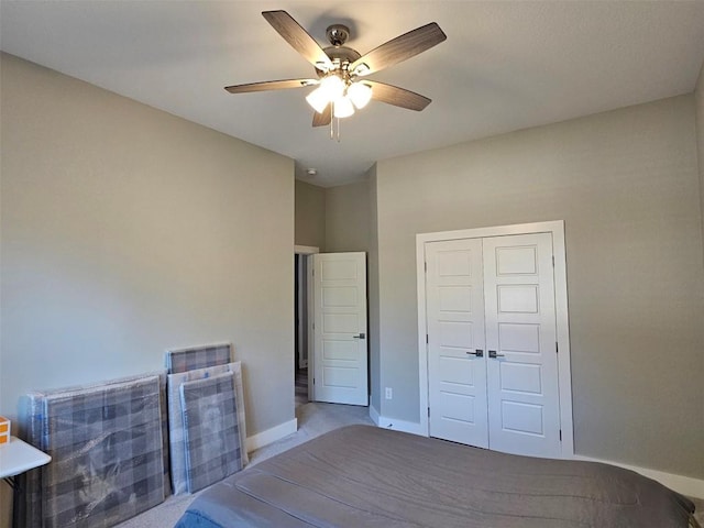 170 Nuuanu Rd, Bastrop, TX 78602 - carpeted bedroom featuring baseboards, a ceiling fan, and a closet