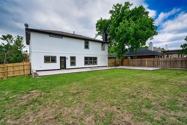 rear view of house with a patio