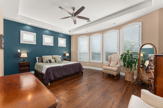 503 Wester Ross Ln, Lakeway, TX 78738 - bedroom with a raised ceiling, hardwood / wood-style flooring, baseboards, a ceiling fan, and recessed lighting