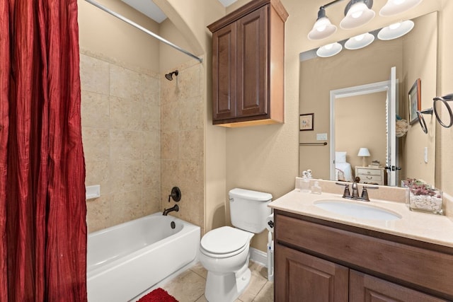 bathroom with shower / bath combo with shower curtain, tile patterned flooring, vanity, toilet, and baseboards