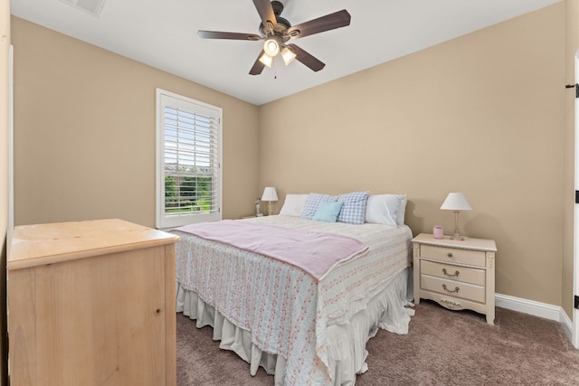 bedroom featuring baseboards, visible vents, ceiling fan, and carpet