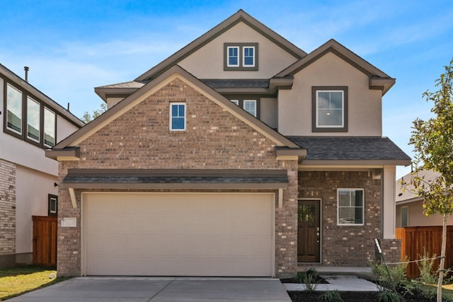 2705 Sage Ranch Dr Unit 25, Leander, TX 78641 - view of front of home with brick siding, driveway, a garage, and roof with shingles