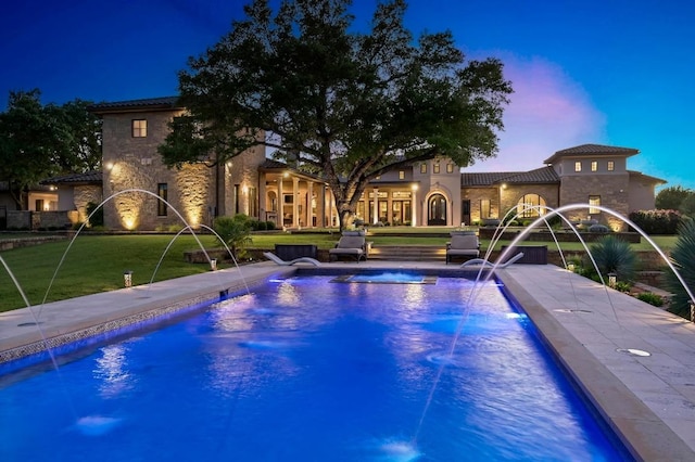 pool featuring a lawn