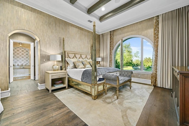 bedroom with wood-type flooring, baseboards, beamed ceiling, visible vents, and ornamental molding