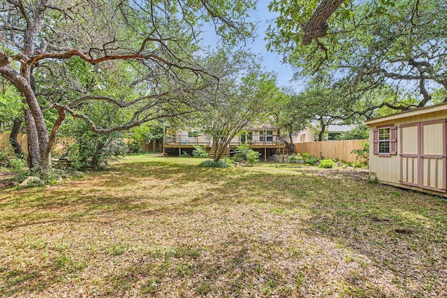 4318 Clarno Dr, Austin, TX 78749 - view of yard with a wooden deck and an outdoor structure