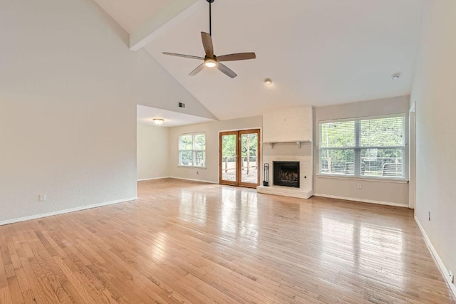 4318 Clarno Dr, Austin, TX 78749 - unfurnished living room featuring beamed ceiling, light wood-type flooring, a ceiling fan, high vaulted ceiling, and baseboards