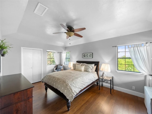 6407 Poncha Pass, Austin, TX 78749 - bedroom with baseboards, a closet, wood finished floors, and ceiling fan