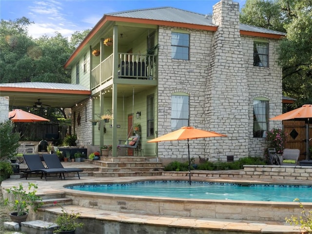 6407 Poncha Pass, Austin, TX 78749 - rear view of property featuring a balcony, metal roof, ceiling fan, and a patio