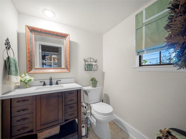 6407 Poncha Pass, Austin, TX 78749 - half bathroom featuring toilet, vanity, and baseboards