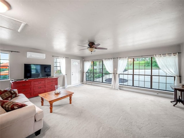 6407 Poncha Pass, Austin, TX 78749 - living room featuring an AC wall unit, attic access, carpet, a ceiling fan, and baseboards