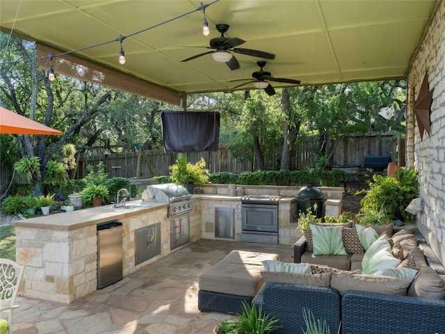 6407 Poncha Pass, Austin, TX 78749 - fenced backyard with outdoor lounge area, a sink, a patio, and a ceiling fan