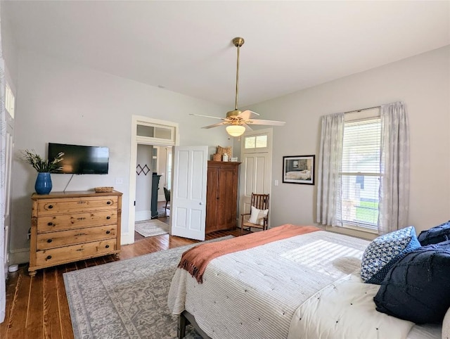 515 E 8th St, Georgetown, TX 78626 - bedroom with ceiling fan and wood finished floors