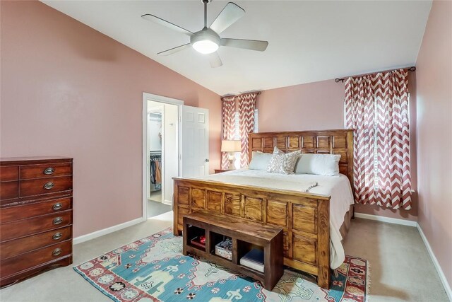 bedroom featuring baseboards, a ceiling fan, carpet flooring, and lofted ceiling