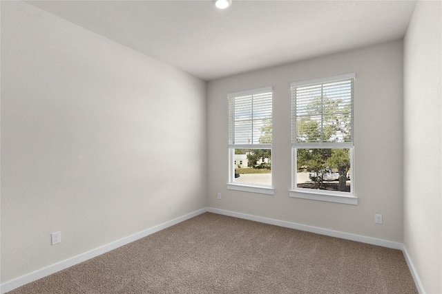 2705 Sage Ranch Dr Unit 22, Leander, TX 78641 - carpeted spare room with baseboards