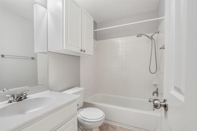 bathroom with vanity, shower / bathing tub combination, toilet, and tile patterned flooring