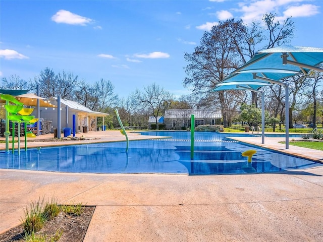 view of swimming pool with a patio and a pool