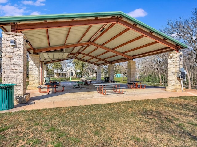 view of property's community with a gazebo and a yard