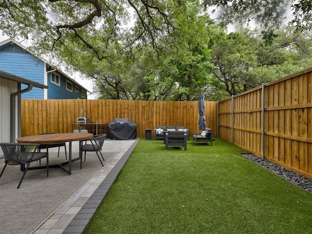 view of yard featuring a patio, outdoor dining area, and an outdoor living space