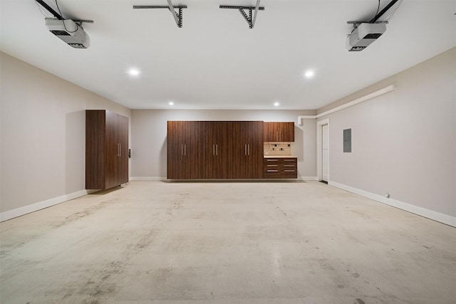 5517 Woodview Ave, Austin, TX 78756 - interior space featuring a garage, recessed lighting, baseboards, and electric panel