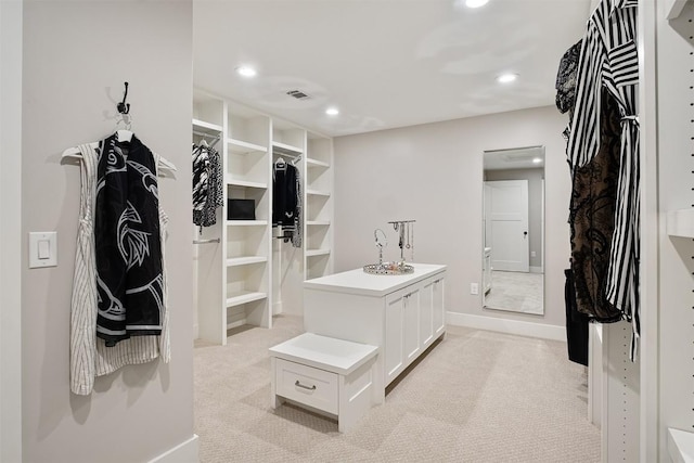 5517 Woodview Ave, Austin, TX 78756 - walk in closet featuring light colored carpet and visible vents