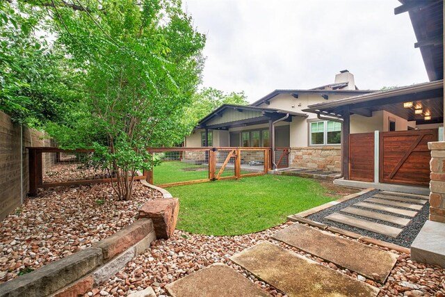 5517 Woodview Ave, Austin, TX 78756 - view of yard with a fenced backyard and a gate