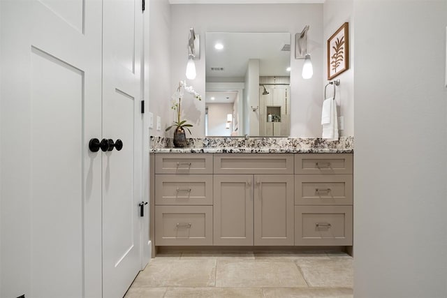 5517 Woodview Ave, Austin, TX 78756 - full bath with vanity, tile patterned floors, a stall shower, and visible vents