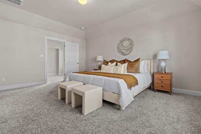 carpeted bedroom with baseboards and visible vents