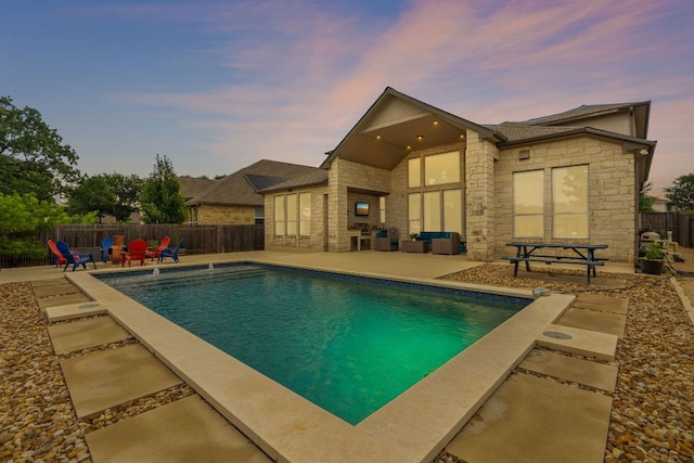 14108 Laurinburg Dr, Austin, TX 78717 - pool at dusk featuring a patio