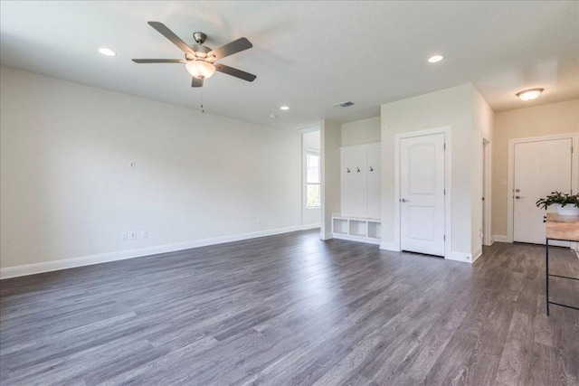 3209 Maysillee St, Austin, TX 78728 - empty room with dark wood-style flooring, ceiling fan, recessed lighting, baseboards, and visible vents