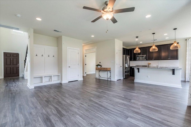 3209 Maysillee St, Austin, TX 78728 - living room featuring baseboards, ceiling fan, dark wood-style flooring, and visible vents