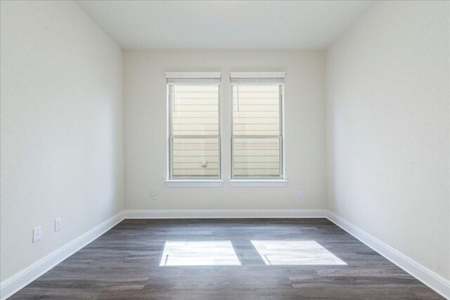 3209 Maysillee St, Austin, TX 78728 - spare room with baseboards and dark wood-style floors
